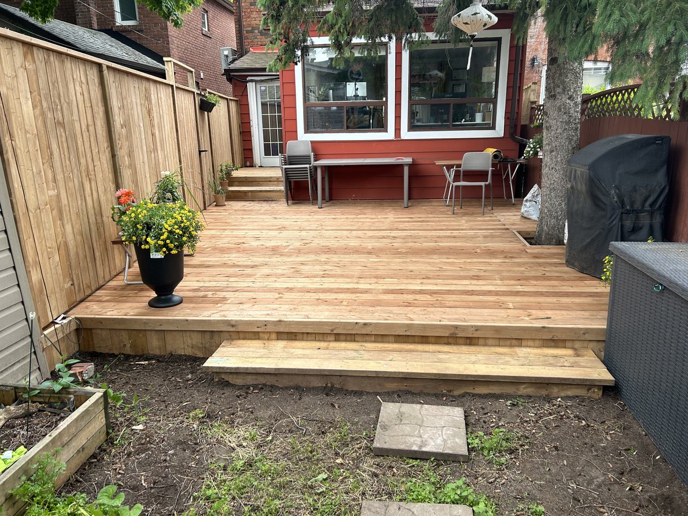 Backyard cedar deck at a red-sided home